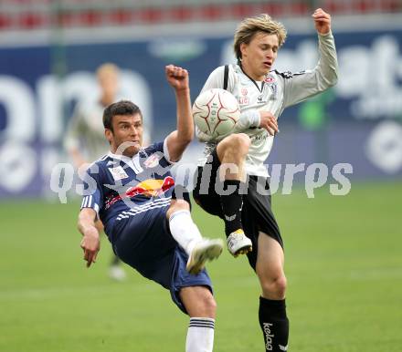 Fussball. Bundesliga. SK Austria Kelag Kaernten  gegen Red Bull Salzburg. Stefan Hierlaender, (Austria Kaernten), Milan Dudic (Salzburg). Klagenfurt, 10.4.2010. 
Foto: Kuess

---
pressefotos, pressefotografie, kuess, qs, qspictures, sport, bild, bilder, bilddatenbank