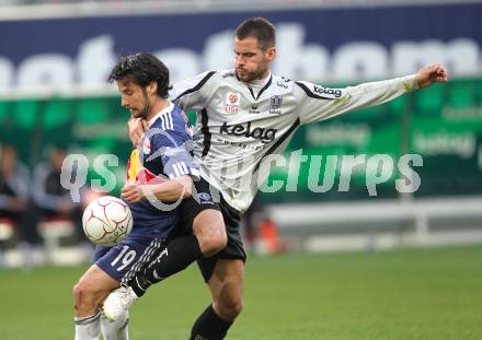 Fussball. Bundesliga. SK Austria Kelag Kaernten  gegen Red Bull Salzburg. Oliver Pusztai, (Austria Kaernten), Simon Cziommer (Salzburg). Klagenfurt, 10.4.2010. 
Foto: Kuess

---
pressefotos, pressefotografie, kuess, qs, qspictures, sport, bild, bilder, bilddatenbank