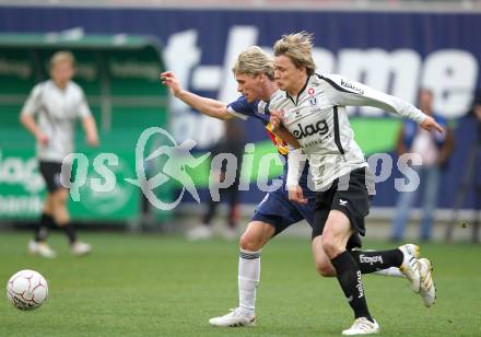 Fussball. Bundesliga. SK Austria Kelag Kaernten  gegen Red Bull Salzburg. Stefan Hierlaender, (Austria Kaernten), Christoph Leitgeb (Salzburg). Klagenfurt, 10.4.2010. 
Foto: Kuess

---
pressefotos, pressefotografie, kuess, qs, qspictures, sport, bild, bilder, bilddatenbank