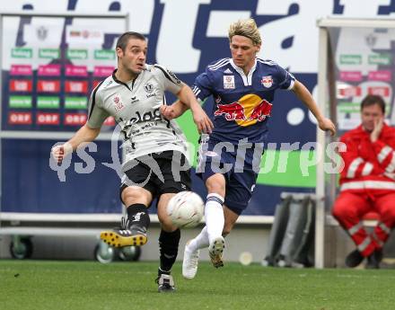 Fussball. Bundesliga. SK Austria Kelag Kaernten  gegen Red Bull Salzburg. Marco Salvatore, (Austria Kaernten), Christoph Leitgeb (Salzburg). Klagenfurt, 10.4.2010. 
Foto: Kuess

---
pressefotos, pressefotografie, kuess, qs, qspictures, sport, bild, bilder, bilddatenbank