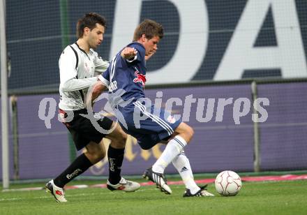 Fussball. Bundesliga. SK Austria Kelag Kaernten  gegen Red Bull Salzburg. Luka Elsner, (Austria Kaernten), Franz Schiemer (Salzburg). Klagenfurt, 10.4.2010. 
Foto: Kuess

---
pressefotos, pressefotografie, kuess, qs, qspictures, sport, bild, bilder, bilddatenbank