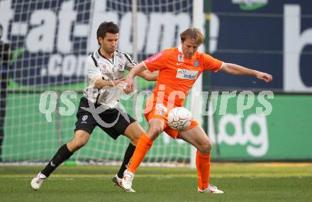 Fussball. Bundesliga. SK Austria Kelag Kaernten gegen FK Austria Wien.  Luka Elsner, (Austria Kaernten), Thomas Jun (Wien). Klagenfurt, 17.4.2010. 
Foto: Kuess

---
pressefotos, pressefotografie, kuess, qs, qspictures, sport, bild, bilder, bilddatenbank