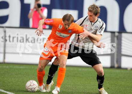 Fussball. Bundesliga. SK Austria Kelag Kaernten gegen FK Austria Wien.  Michael Sollbauer, (Austria Kaernten), Thomas Jun (Wien). Klagenfurt, 17.4.2010. 
Foto: Kuess

---
pressefotos, pressefotografie, kuess, qs, qspictures, sport, bild, bilder, bilddatenbank