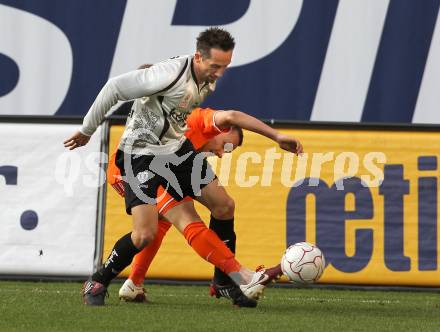 Fussball. Bundesliga. SK Austria Kelag Kaernten gegen FK Austria Wien.  Matthias Dollinger, (Austria Kaernten), Michael Liendl (Wien). Klagenfurt, 17.4.2010. 
Foto: Kuess

---
pressefotos, pressefotografie, kuess, qs, qspictures, sport, bild, bilder, bilddatenbank