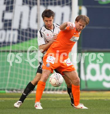 Fussball. Bundesliga. SK Austria Kelag Kaernten gegen FK Austria Wien.  Luka Elsner, (Austria Kaernten), Thomas Jun (Wien). Klagenfurt, 17.4.2010. 
Foto: Kuess

---
pressefotos, pressefotografie, kuess, qs, qspictures, sport, bild, bilder, bilddatenbank