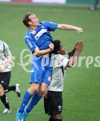 Fussball OEFB Stiegl Cup. SK Austria Kaernten gegen SC Magna Wr. Neustadt. Sandro Ferreira Da Silva (Kaernten), Pavel Kostal (Wr. Neustadt). Klagenfurt, am 20.4.2010.
Foto: Kuess
---
pressefotos, pressefotografie, kuess, qs, qspictures, sport, bild, bilder, bilddatenbank