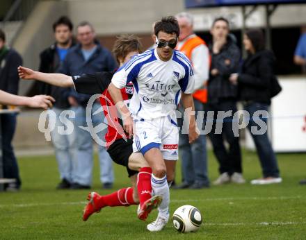 Fussball. Regionalliga. SK Treibach gegen WAC/St. Andrae Lavanttal. Hutter Christian (Treibach), Rotter Dominik (WAC/St.Andrae). Treibach, 20.4.2010.
Foto: Kuess 

---
pressefotos, pressefotografie, kuess, qs, qspictures, sport, bild, bilder, bilddatenbank