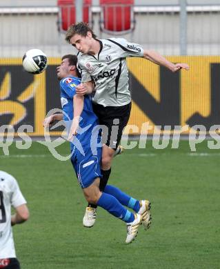 Fussball OEFB Stiegl Cup. SK Austria Kaernten gegen SC Magna Wr. Neustadt. Michael Sollbauer (Kaernten), Tomas Simkovic  (Wr. Neustadt). Klagenfurt, am 20.4.2010.
Foto: Kuess
---
pressefotos, pressefotografie, kuess, qs, qspictures, sport, bild, bilder, bilddatenbank