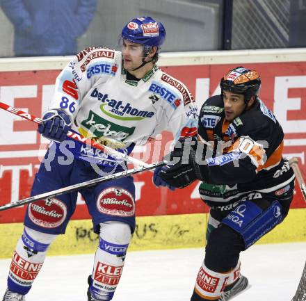 EBEL. Eishockey Bundesliga. EC Pasut VSV gegen Graz 99ers. Jonathan Ferland (VSV), Warren Norris  (Graz). Villach, am 15.1.2010.
Foto: Kuess 


---
pressefotos, pressefotografie, kuess, qs, qspictures, sport, bild, bilder, bilddatenbank