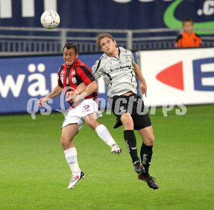 Fussball. Bundesliga. SK Austria Kelag Kaernten gegen LASK Linz.  Michael Sollbauer, (Austria Kaernten), Juergen Panis (Linz). Klagenfurt, 5.5.2010. 
Foto: Kuess

---
pressefotos, pressefotografie, kuess, qs, qspictures, sport, bild, bilder, bilddatenbank