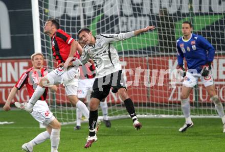 Fussball. Bundesliga. SK Austria Kelag Kaernten gegen LASK Linz.  Markus Pink, Chinchilla, (Austria Kaernten), Juergen Macho (Linz). Klagenfurt, 5.5.2010. 
Foto: Kuess

---
pressefotos, pressefotografie, kuess, qs, qspictures, sport, bild, bilder, bilddatenbank