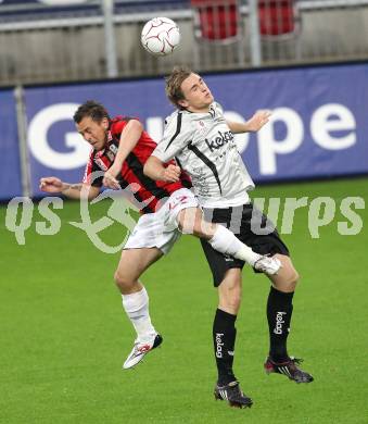 Fussball. Bundesliga. SK Austria Kelag Kaernten gegen LASK Linz.  Michael Sollbauer (Austria Kaernten), Juergen Panis (Linz). Klagenfurt, 5.5.2010. 
Foto: Kuess

---
pressefotos, pressefotografie, kuess, qs, qspictures, sport, bild, bilder, bilddatenbank