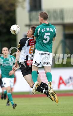 Fussball. Regionalliga. SK St. Andrae/Lavanttal gegen SC Sparkasse Elin Weiz. Falk Christian (St. Andrae), Friedl Christian (Weiz). Wolfsberg, 7.5.2010.
Foto: Kuess

---
pressefotos, pressefotografie, kuess, qs, qspictures, sport, bild, bilder, bilddatenbank