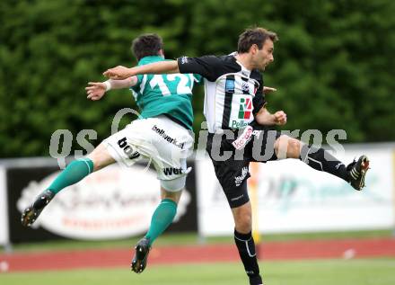 Fussball. Regionalliga. SK St. Andrae/Lavanttal gegen SC Sparkasse Elin Weiz. Reich Marco (St. Andrae),  Mauerhofer Sascha (Weiz).  Wolfsberg, 7.5.2010.
Foto: Kuess

---
pressefotos, pressefotografie, kuess, qs, qspictures, sport, bild, bilder, bilddatenbank