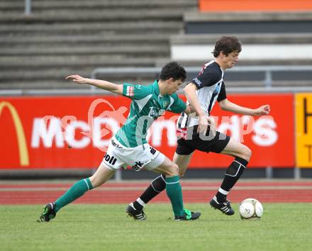 Fussball. Regionalliga. SK St. Andrae/Lavanttal gegen SC Sparkasse Elin Weiz. Falk Christian (St. Andrae), Stachel Daniel (Weiz). Wolfsberg, 7.5.2010.
Foto: Kuess

---
pressefotos, pressefotografie, kuess, qs, qspictures, sport, bild, bilder, bilddatenbank