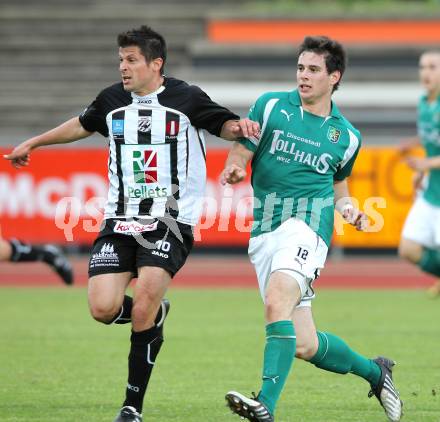 Fussball. Regionalliga. SK St. Andrae/Lavanttal gegen SC Sparkasse Elin Weiz. Kreuz Markus  (St. Andrae), Mauerhofer Sascha (Weiz). Wolfsberg, 7.5.2010.
Foto: Kuess

---
pressefotos, pressefotografie, kuess, qs, qspictures, sport, bild, bilder, bilddatenbank