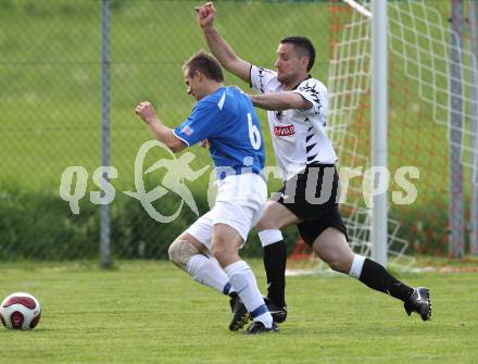 Fussball Unterliga Ost. ASKOE Koettmannsdorf gegen SK Kuehnsdorf. Gabor Ferenczi (Koettmannsdorf), Tadej Steharnik (Kuehnsdorf). Klagenfurt, am 9.5.2010.
Foto: Kuess
---
pressefotos, pressefotografie, kuess, qs, qspictures, sport, bild, bilder, bilddatenbank