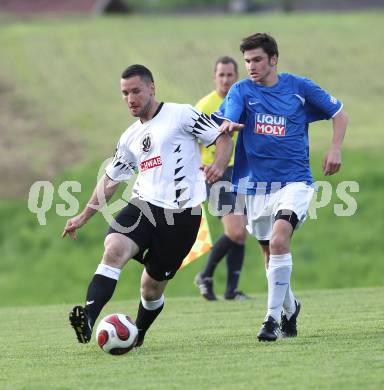 Fussball Unterliga Ost. ASKOE Koettmannsdorf gegen SK Kuehnsdorf. Kristian Smokovic (Koettmannsdorf),  Tadej Steharnik (Kuehnsdorf). Klagenfurt, am 9.5.2010.
Foto: Kuess
---
pressefotos, pressefotografie, kuess, qs, qspictures, sport, bild, bilder, bilddatenbank