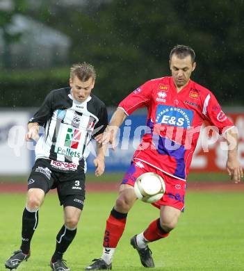 Fussball. Regionalliga. WAC SK St. Andrae/Lavanttal gegen SAK Celovec/Klagenfurt.  Manuel Kerhe, (St.Andrae), Goran Jolic (SAK). Wolfsberg, 11.5.2010. 
Foto: Kuess

---
pressefotos, pressefotografie, kuess, qs, qspictures, sport, bild, bilder, bilddatenbank