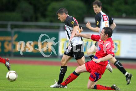 Fussball. Regionalliga. WAC SK St. Andrae/Lavanttal gegen SAK Celovec/Klagenfurt.  Markus Kreuz, (St.Andrae), Albin Kesselbacher (SAK). Wolfsberg, 11.5.2010. 
Foto: Kuess

---
pressefotos, pressefotografie, kuess, qs, qspictures, sport, bild, bilder, bilddatenbank