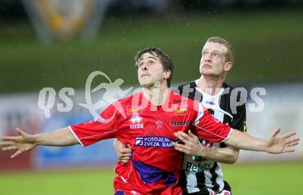 Fussball. Regionalliga. WAC SK St. Andrae/Lavanttal gegen SAK Celovec/Klagenfurt. Daniel Karl Oberlaender,  (St.Andrae), Grega Triplat (SAK). Wolfsberg, 11.5.2010. 
Foto: Kuess

---
pressefotos, pressefotografie, kuess, qs, qspictures, sport, bild, bilder, bilddatenbank