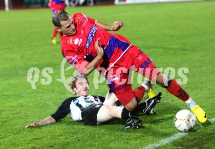 Fussball. Regionalliga. WAC SK St. Andrae/Lavanttal gegen SAK Celovec/Klagenfurt. Mathias Berchtold (St.Andrae), Christian Dlopst(SAK). Wolfsberg, 11.5.2010. 
Foto: Kuess

---
pressefotos, pressefotografie, kuess, qs, qspictures, sport, bild, bilder, bilddatenbank