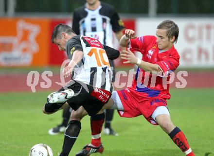 Fussball. Regionalliga. WAC SK St. Andrae/Lavanttal gegen SAK Celovec/Klagenfurt. Markus Kreuz, (St.Andrae), Martin Trattnig (SAK). Wolfsberg, 11.5.2010. 
Foto: Kuess

---
pressefotos, pressefotografie, kuess, qs, qspictures, sport, bild, bilder, bilddatenbank