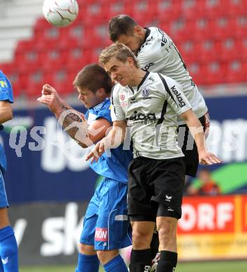 Fussball. Tipp3-Bundesliga. SK Austria Kaernten gegen SC Magna Wiener Neustadt. Peter Pucker, Oliver Pusztai, (Austria Kaernten), Thomas Helly (Wr. Neustadt). Klagenfurt, 13.5.2010. 
Foto: Kuess 

---
pressefotos, pressefotografie, kuess, qs, qspictures, sport, bild, bilder, bilddatenbank