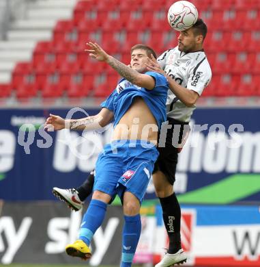 Fussball. Tipp3-Bundesliga. SK Austria Kaernten gegen SC Magna Wiener Neustadt.  Oliver Pusztai, (Austria Kaernten), Thomas Helly (Wr. Neustadt). Klagenfurt, 13.5.2010. 
Foto: Kuess 

---
pressefotos, pressefotografie, kuess, qs, qspictures, sport, bild, bilder, bilddatenbank