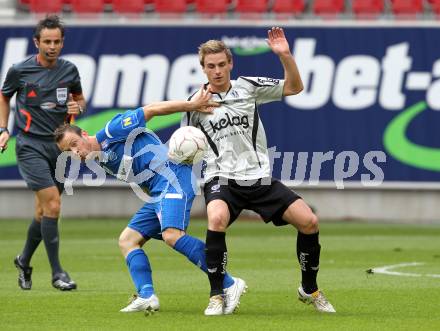 Fussball. Tipp3-Bundesliga. SK Austria Kaernten gegen SC Magna Wiener Neustadt. Michael Sollbauer (Austria Kaernten), Bernd Besenlehner (Wr. Neustadt). Klagenfurt, 13.5.2010. 
Foto: Kuess 

---
pressefotos, pressefotografie, kuess, qs, qspictures, sport, bild, bilder, bilddatenbank