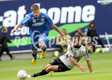 Fussball. Tipp3-Bundesliga. SK Austria Kaernten gegen SC Magna Wiener Neustadt. Oliver Pusztai, (Austria Kaernten), Thomas Helly (Wr. Neustadt). Klagenfurt, 13.5.2010. 
Foto: Kuess 

---
pressefotos, pressefotografie, kuess, qs, qspictures, sport, bild, bilder, bilddatenbank