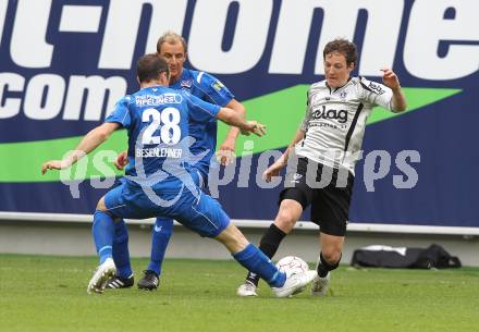 Fussball. Tipp3-Bundesliga. SK Austria Kaernten gegen SC Magna Wiener Neustadt. Mario Kropefl (Austria Kaernten), Bernd Besenlehner (Wr. Neustadt). Klagenfurt, 13.5.2010. 
Foto: Kuess 

---
pressefotos, pressefotografie, kuess, qs, qspictures, sport, bild, bilder, bilddatenbank