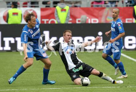 Fussbal. OEFB Stiegl Cup. Sturm Graz gegen FC Magna Wiener Neustadt. Klemen Lavric,  (Graz), Pavel Kostal (Wr. Neustadt). Klagenfurt, 16.5.2010. 
Foto: Kuess 

---
pressefotos, pressefotografie, kuess, qs, qspictures, sport, bild, bilder, bilddatenbank