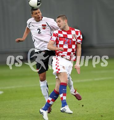 Fussball. Laenderspiel Oesterreich gegen Kroatien. Aleksandar Dragovic, (Oesterreich), Mladen Petric (Kroatien). Klagenfurt, 19.5.2010. 
Foto: Kuess 

---
pressefotos, pressefotografie, kuess, qs, qspictures, sport, bild, bilder, bilddatenbank