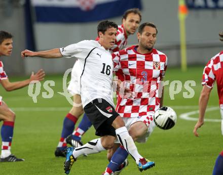 Fussball. Laenderspiel Oesterreich gegen Kroatien. Zlatko Junuzovic, (Oesterreich), Josip Simunic (Kroatien). Klagenfurt, 19.5.2010. 
Foto: Kuess 

---
pressefotos, pressefotografie, kuess, qs, qspictures, sport, bild, bilder, bilddatenbank