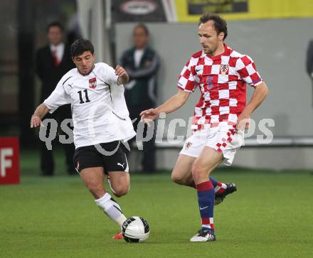 Fussball. Laenderspiel Oesterreich gegen Kroatien. Uemit Korkmaz (Oesterreich), Gordon Schildenfeld (Kroatien). Klagenfurt, 19.5.2010. 
Foto: Kuess 

---
pressefotos, pressefotografie, kuess, qs, qspictures, sport, bild, bilder, bilddatenbank