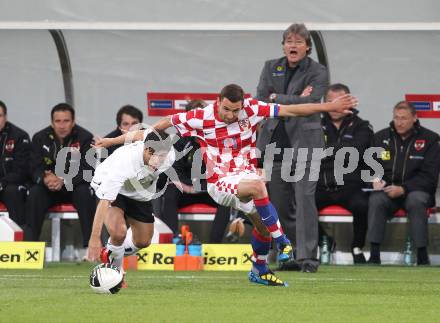 Fussball. Laenderspiel Oesterreich gegen Kroatien. Uemit Korkmaz (Oesterreich), Darijo Srna (Kroatien). Klagenfurt, 19.5.2010. 
Foto: Kuess 

---
pressefotos, pressefotografie, kuess, qs, qspictures, sport, bild, bilder, bilddatenbank