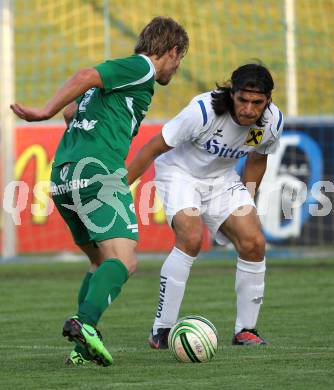 Fussball Regionalliga. FC St. Veit gegen FC Superfund Pasching. Carlos Chaile (St. Veit), Marc Sand (Pasching). St. Veit, am 28.5.2010.
Foto: Kuess
---
pressefotos, pressefotografie, kuess, qs, qspictures, sport, bild, bilder, bilddatenbank