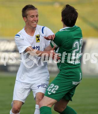 Fussball Regionalliga. FC St. Veit gegen FC Superfund Pasching. Roman Adunka (St. Veit), Marcel Ketelaer (Pasching). St. Veit, am 28.5.2010.
Foto: Kuess
---
pressefotos, pressefotografie, kuess, qs, qspictures, sport, bild, bilder, bilddatenbank