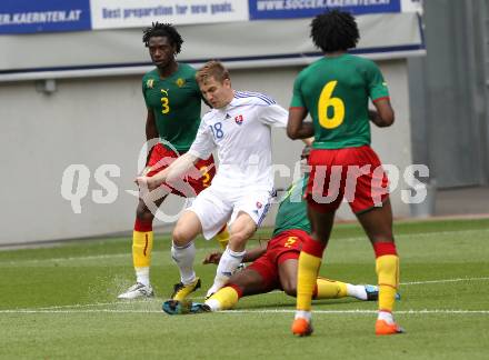 Fussball Laenderspiel. Testspiel Kamerun gegen Slowakei. Nicolas Nkoulou, Sebastien Bassong,  (Kamerun), Erik Jendrisek (Slowakei). Klagenfurt, am 29.5.2010.
Foto: Kuess


---
pressefotos, pressefotografie, kuess, qs, qspictures, sport, bild, bilder, bilddatenbank