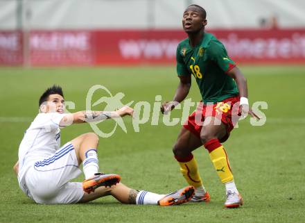 Fussball Laenderspiel. Testspiel Kamerun gegen Slowakei. Enoh Eyong,  (Kamerun), Marek Hamsik (Slowakei). Klagenfurt, am 29.5.2010.
Foto: Kuess

---
pressefotos, pressefotografie, kuess, qs, qspictures, sport, bild, bilder, bilddatenbank