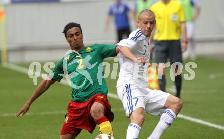 Fussball Laenderspiel. Testspiel Kamerun gegen Slowakei.  Benoit Assou Ekotto, (Kamerun), Vladimir Weiss (Slowakei). Klagenfurt, am 29.5.2010.
Foto: Kuess

---
pressefotos, pressefotografie, kuess, qs, qspictures, sport, bild, bilder, bilddatenbank