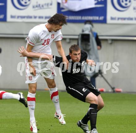 Fussball Laenderspiel. Testspiel Serbien gegen Neuseeland. Neven Subotic, (Serbien),  Chris Wood  (Neuseeland). Klagenfurt, am 29.5.2010.
Foto: Kuess

---
pressefotos, pressefotografie, kuess, qs, qspictures, sport, bild, bilder, bilddatenbank