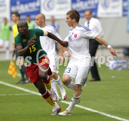 Fussball Laenderspiel. Testspiel Kamerun gegen Slowakei. Achille Webo,  (Kamerun),  Peter Pekarik (Slowakei). Klagenfurt, am 29.5.2010.
Foto: Kuess

---
pressefotos, pressefotografie, kuess, qs, qspictures, sport, bild, bilder, bilddatenbank