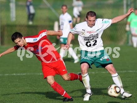 Fussball. Kaerntner Liga. FC Oberwinkler Lendorf gegen SV Spittal/Drau. Martin Nagy (Lendorf), Paul Jury (Spittal). Lendorf, 30.5.2010.
Foto: Kuess
---
pressefotos, pressefotografie, kuess, qs, qspictures, sport, bild, bilder, bilddatenbank