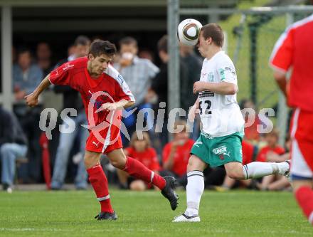 Fussball. Kaerntner Liga. FC Oberwinkler Lendorf gegen SV Spittal/Drau. Nagy Martin (Lendorf), Jury Paul (Spittal). Lendorf, 30.5.2010.
Foto: Kuess
---
pressefotos, pressefotografie, kuess, qs, qspictures, sport, bild, bilder, bilddatenbank