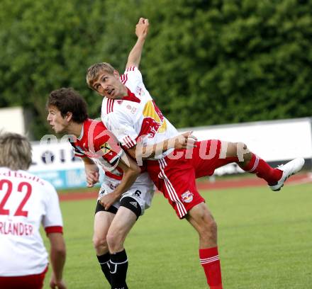 Fussball. Testspiel. WAC St. Andrae gegen Red Bull Salzburg. Christian Falk (WAC), Thomas Augustinussen (Salzburg). Wolfsberg, 22.6.2010.
Foto: Kuess

---
pressefotos, pressefotografie, kuess, qs, qspictures, sport, bild, bilder, bilddatenbank