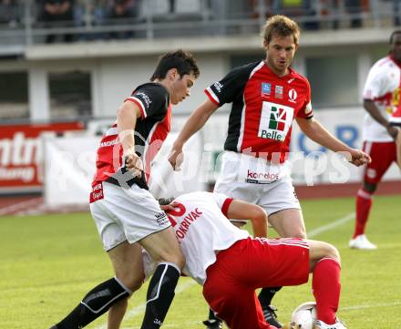 Fussball. Testspiel. WAC St. Andrae gegen Red Bull Salzburg. Roland Putsche (WAC), Nikola Pokrivac (Salzburg).
Wolfsberg, 22.6.2010.
Foto: Kuess
---
pressefotos, pressefotografie, kuess, qs, qspictures, sport, bild, bilder, bilddatenbank