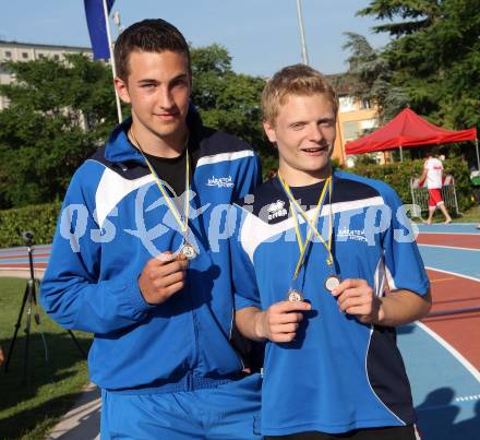 Alpe Adria Jugendspiele. Leichtathletik. Reinhold Hollauf, Kevin Grimschitz. Pordenone, am 23.6.2010.
Foto: Kuess
---
pressefotos, pressefotografie, kuess, qs, qspictures, sport, bild, bilder, bilddatenbank