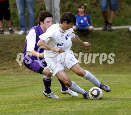 Fussball. Testspiel. SK Austria Klagenfurt gegen Nova Gorica. Martin Tschernitz (Klagenfurt), Etien Velikonja (Nova Gorica). Ludmannsdorf, 2.7.2010.
Foto: Kuess
---
pressefotos, pressefotografie, kuess, qs, qspictures, sport, bild, bilder, bilddatenbank